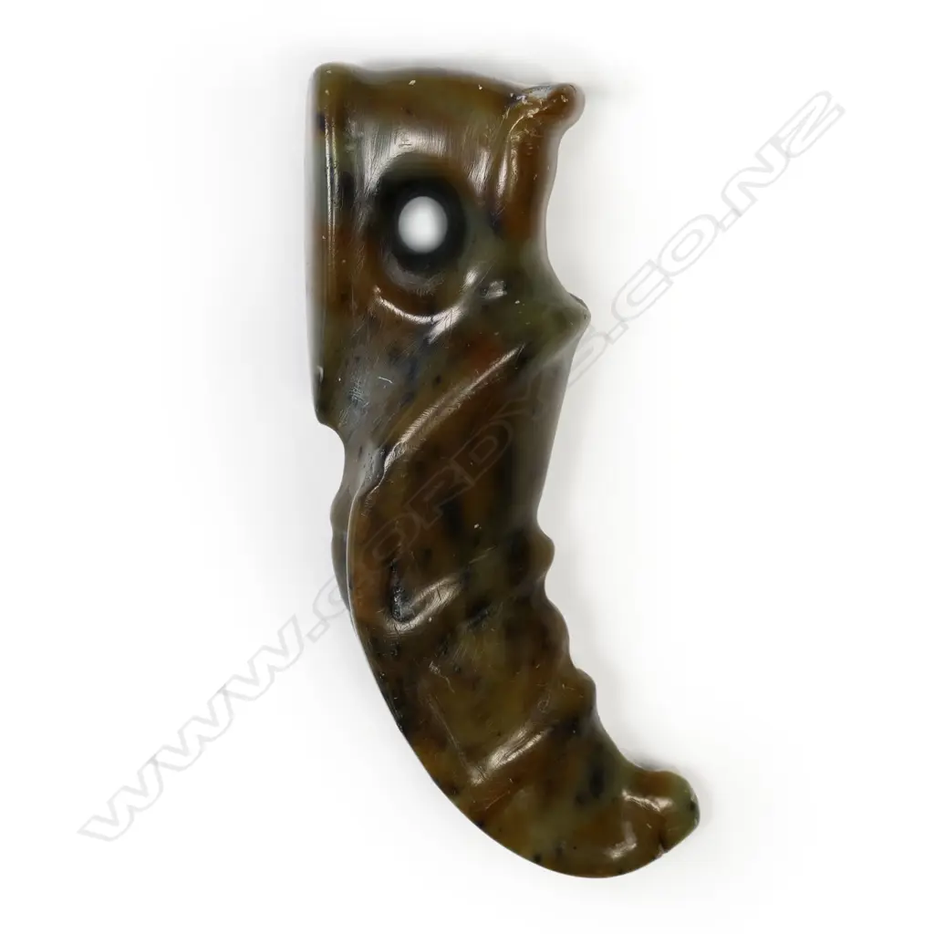 A rare Māori pounamu (serpentine) rei puta pendant, Image 1++